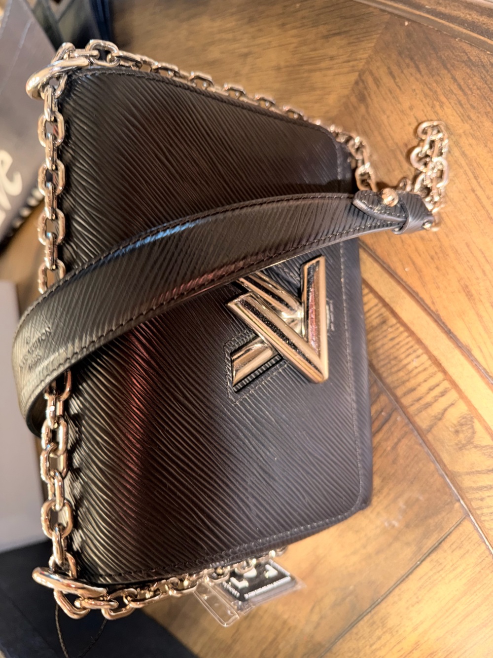 Louis Vuitton Black Epi Leather Twist with silver LV Hardware
